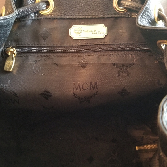 Authentic MCM Studded Black Leather Backpack in excellent used condition. - Picture 13 of 16